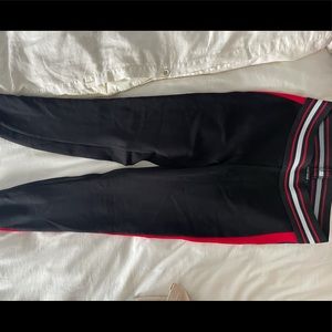 Black leggings with red stripe